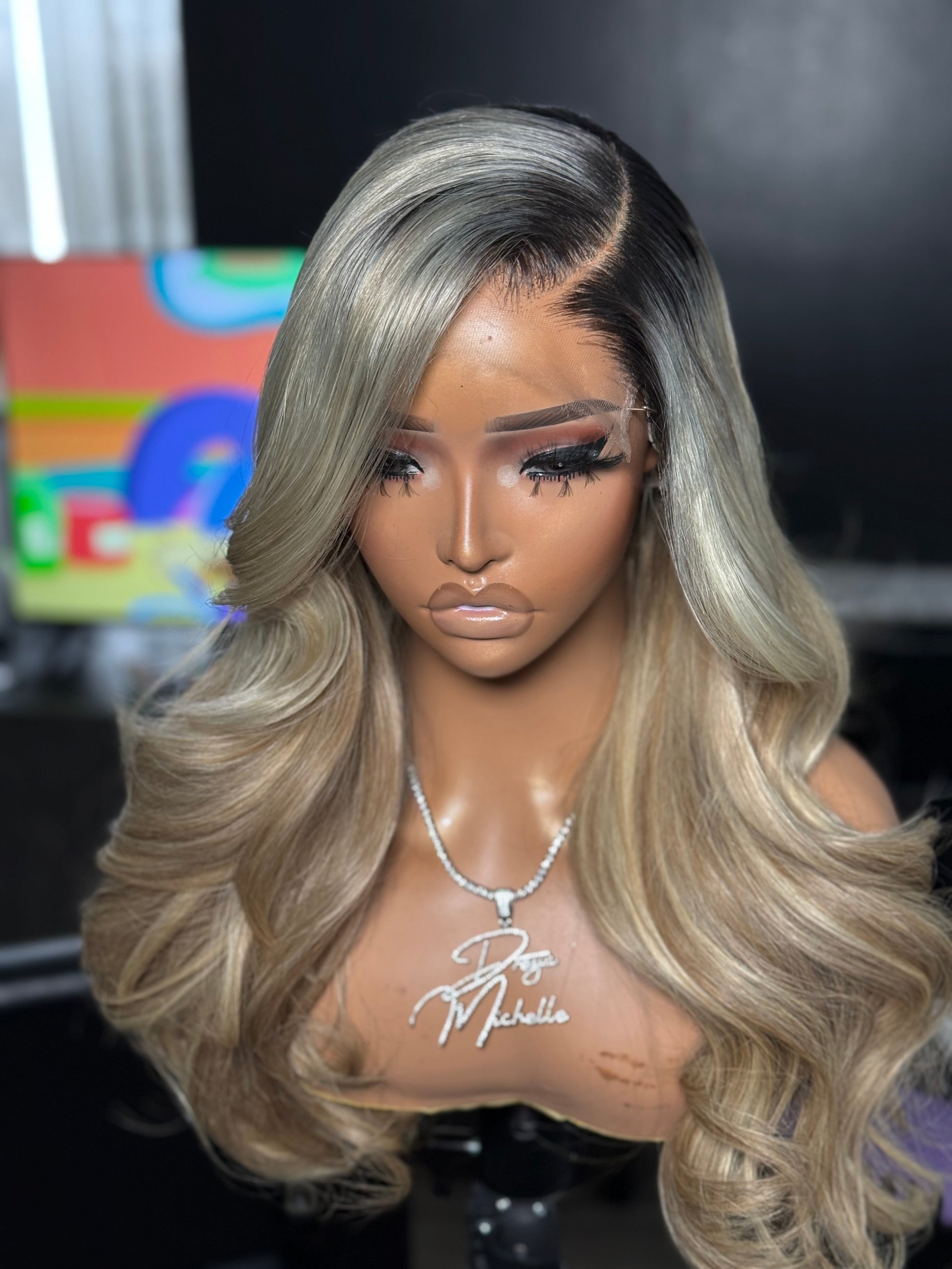 Natural Hairline view of a custom blonde wig with dark roots 